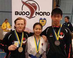 Daniel, Frame och Kevin med guld respektive silver