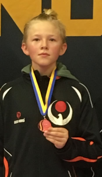 Kevin med brons i kumite