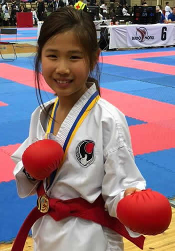 Liona med guld (kumite) och brons (kata) 